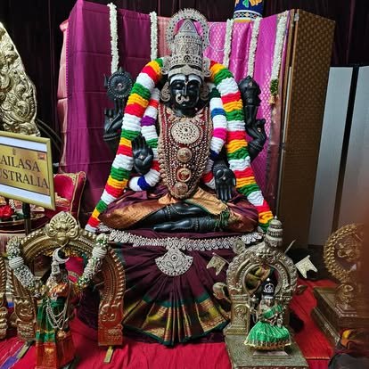 Deity in earth-toned alankaram