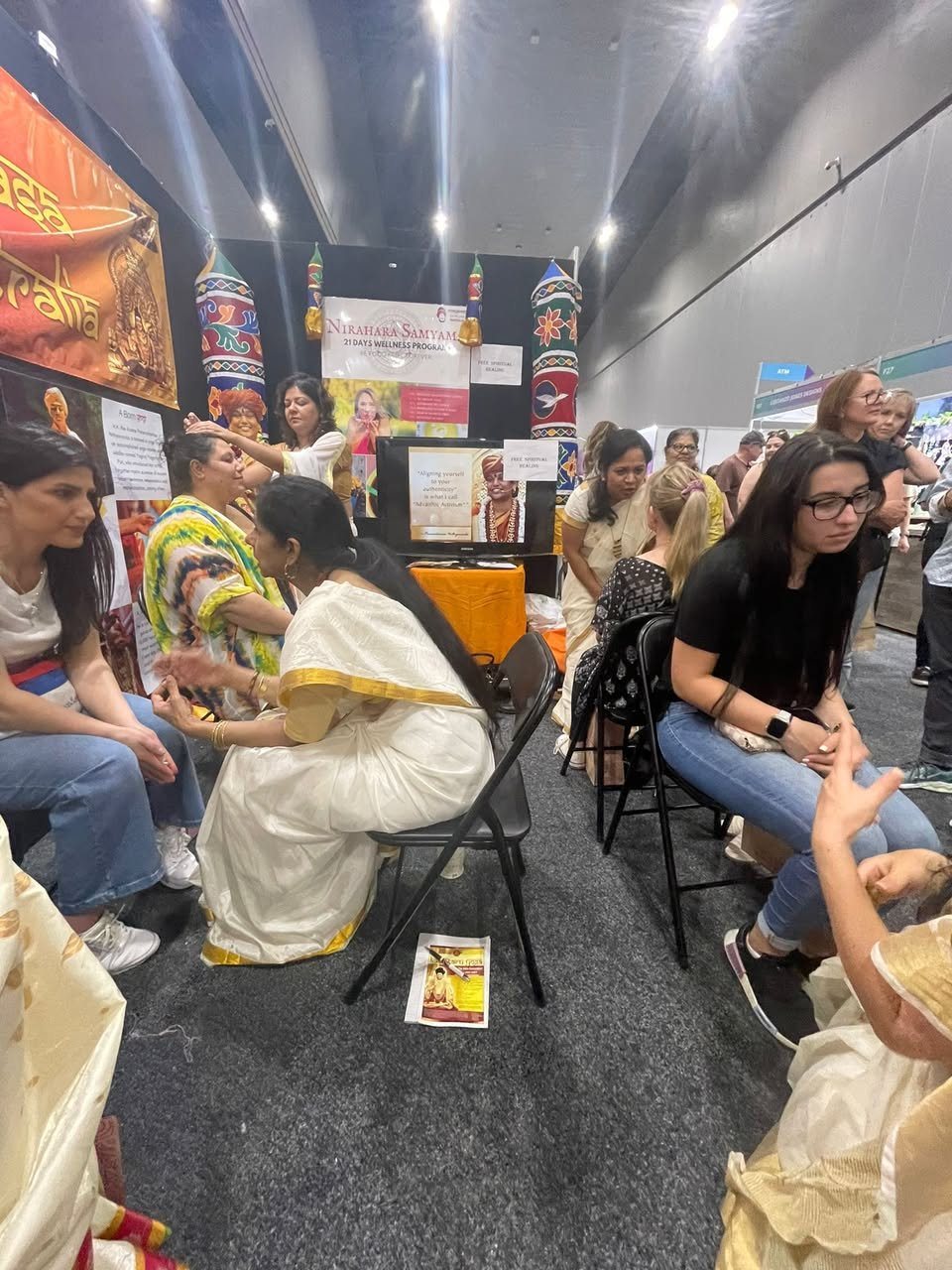KAILASA Australia devotees serving visitors at a community festival